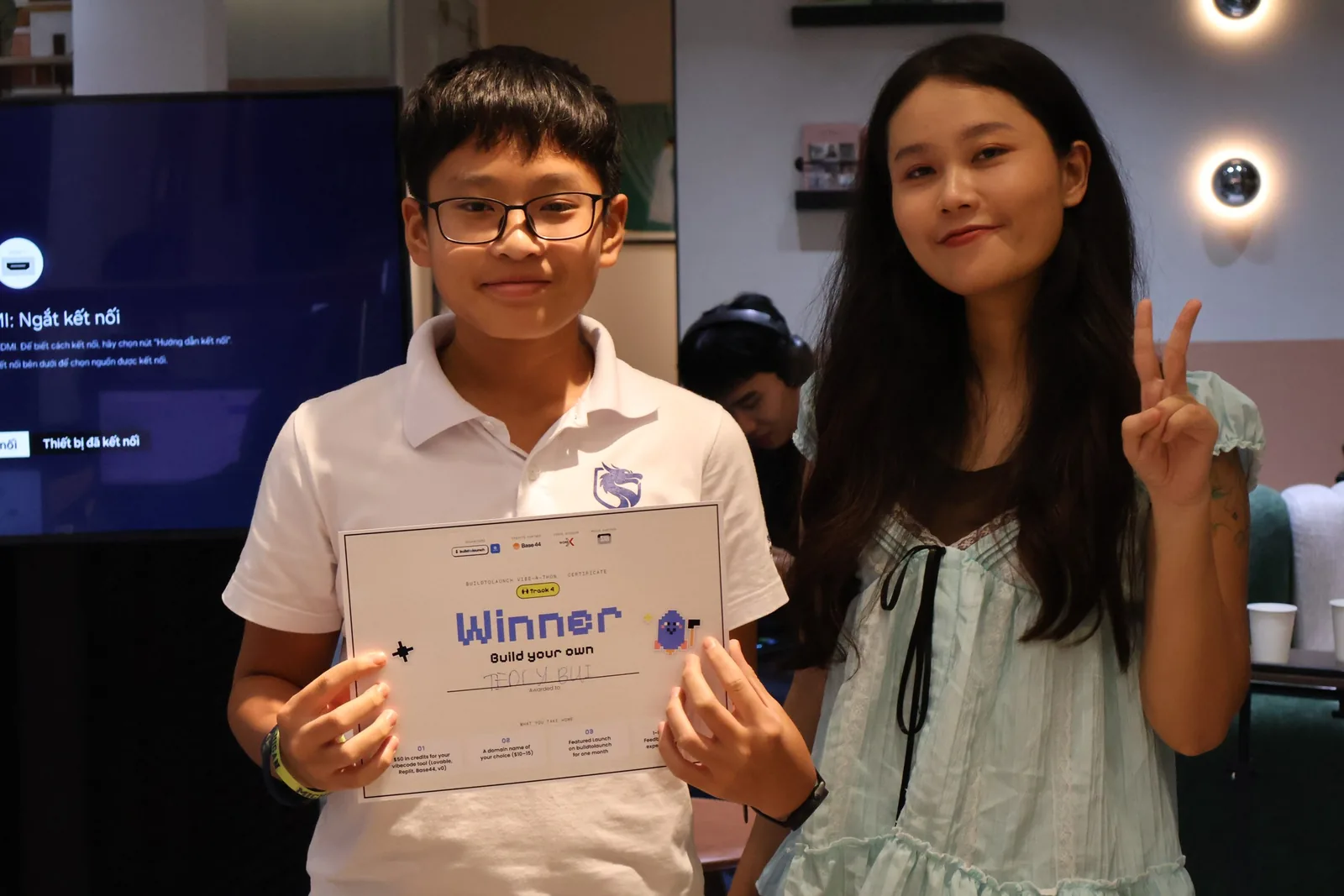 Teddy Bui with the Build your own winner certificate